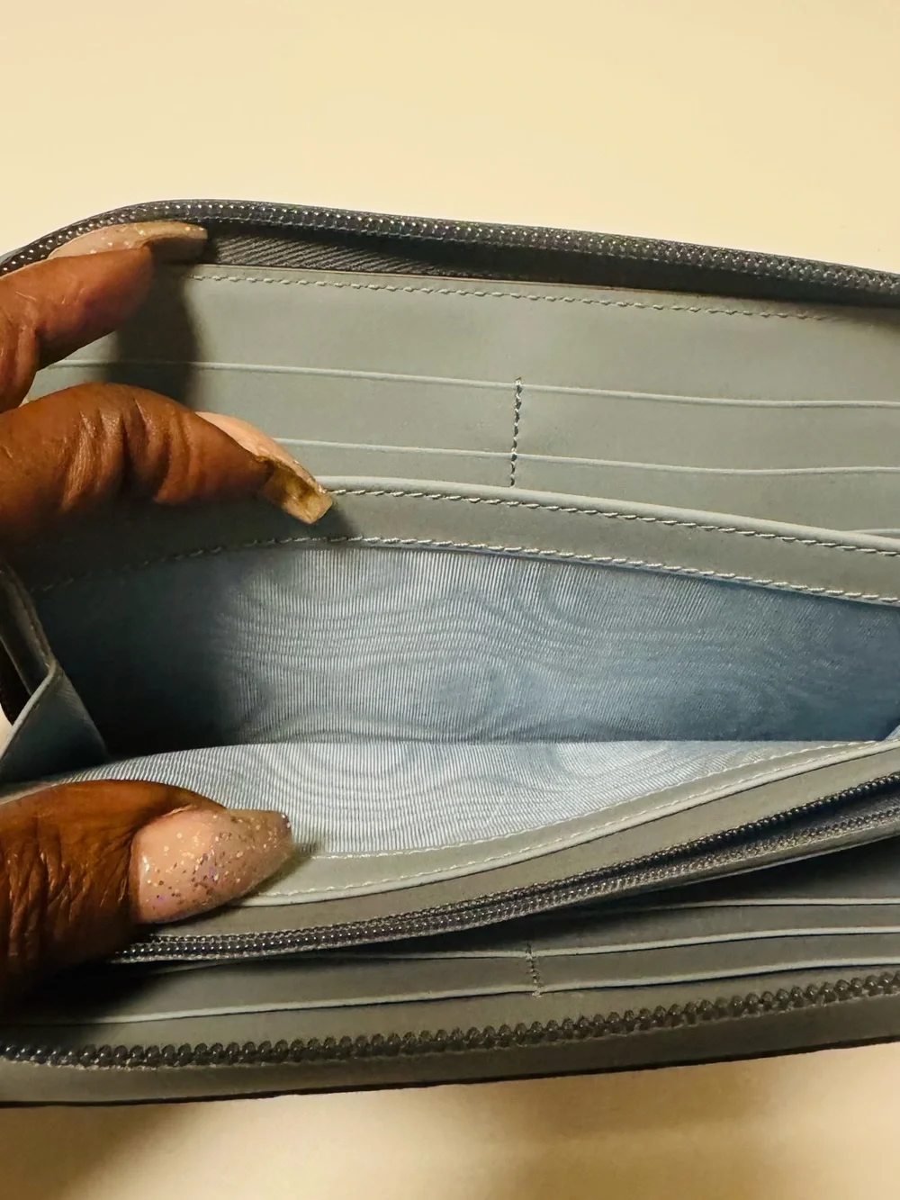 Gucci Light Blue Embossed GG Zip-Around Wallet